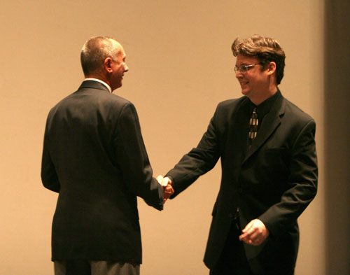 Barry Morrow welcomes Lane Wyrick on stage at World Premiere